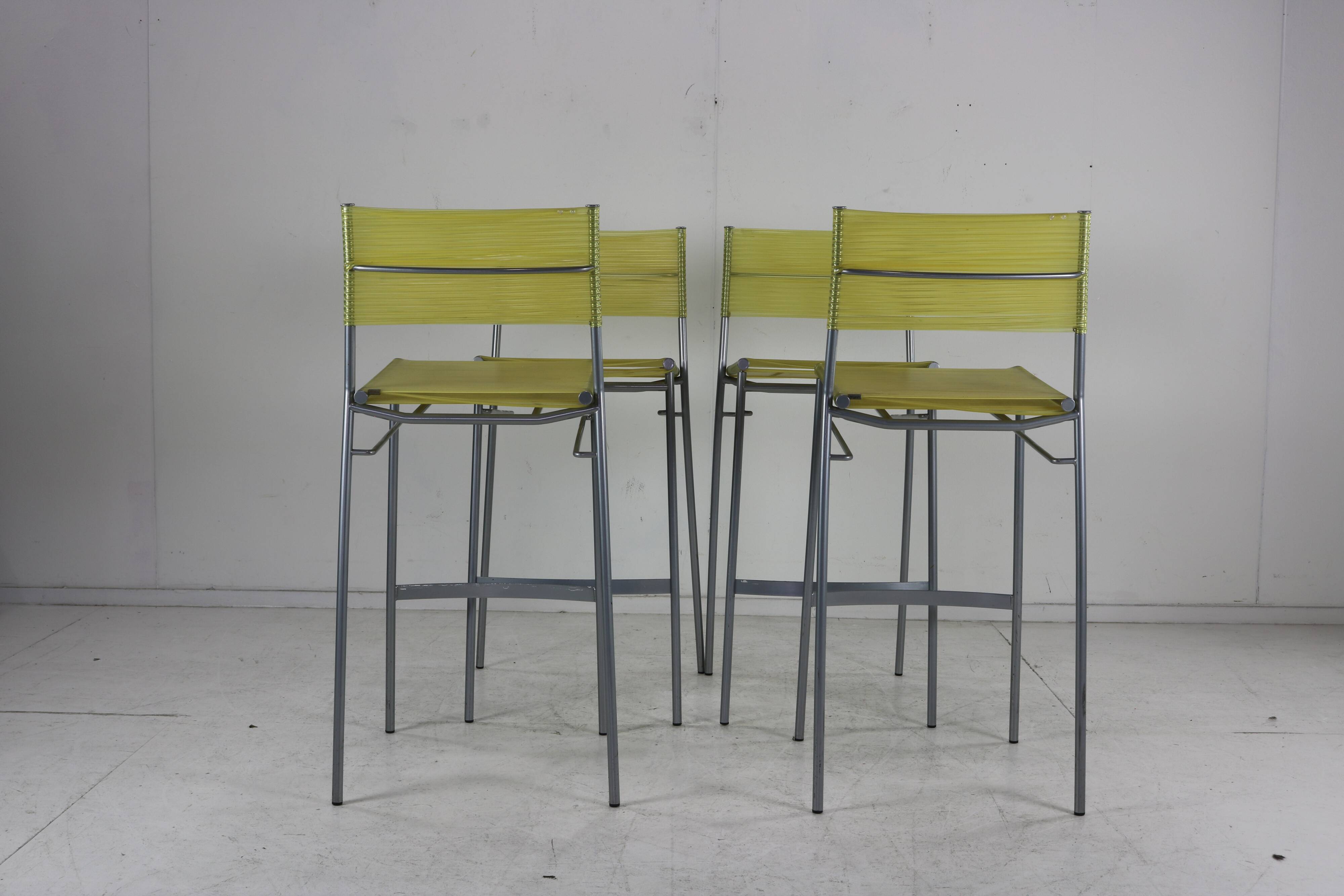 Set of four barstools by Tito Agnoli for Pierantonio Bonacina