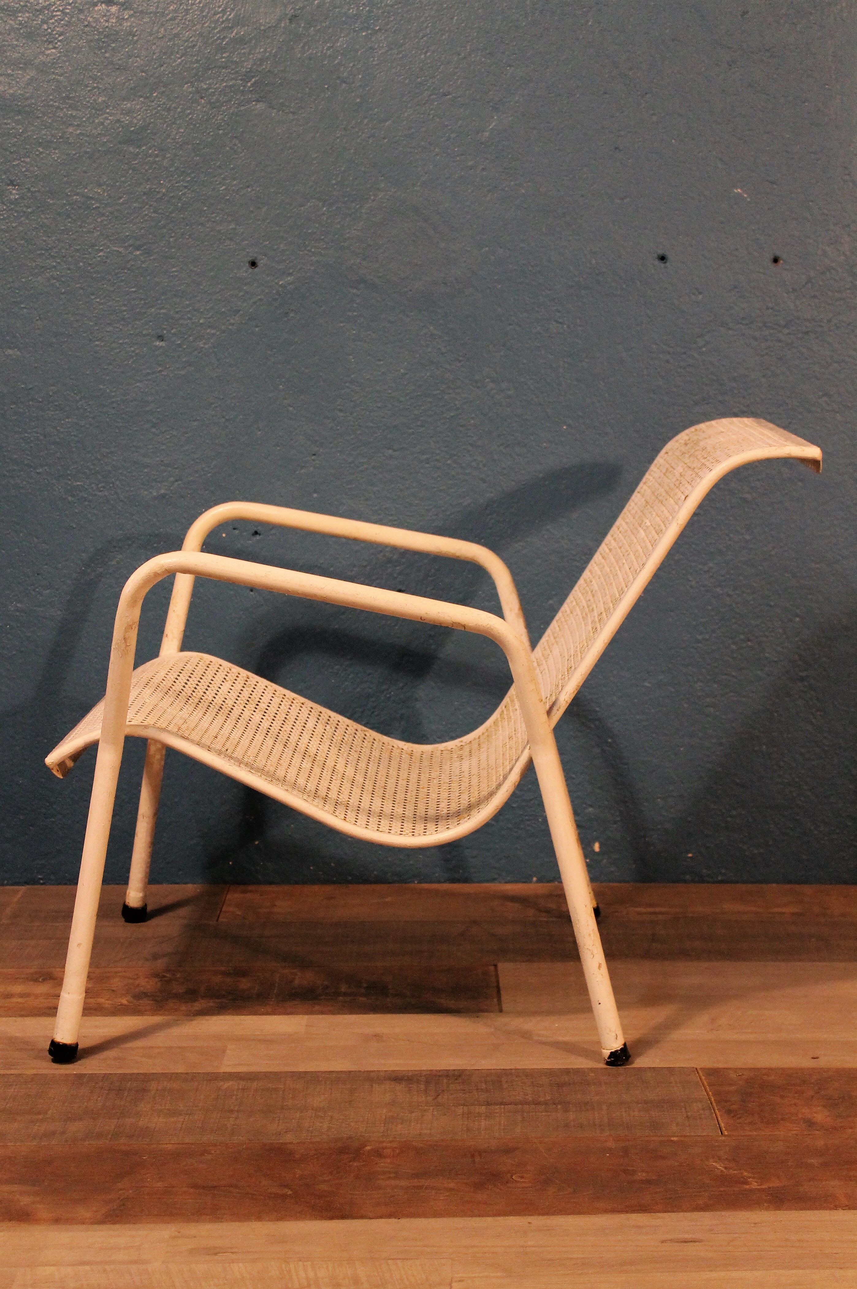 1960 perforated metal garden armchairs
