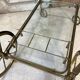 Rolling bar cart in brass and bronze circa 1960