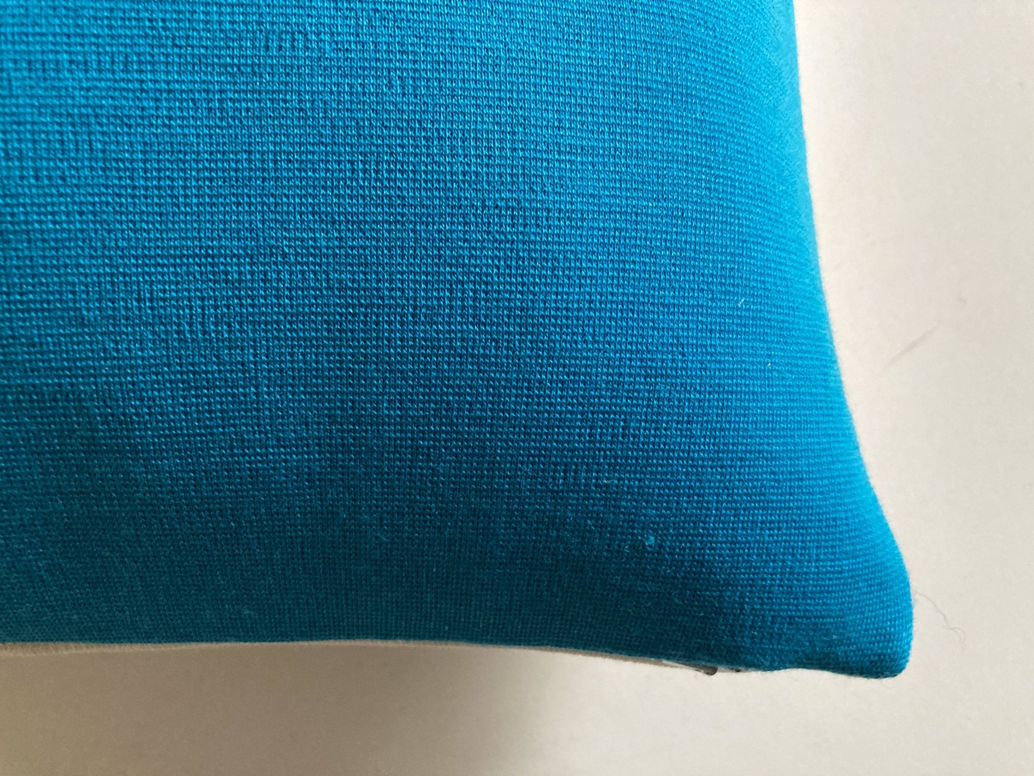 Coussin en jersey de laine Racine space age 1960 recto verso