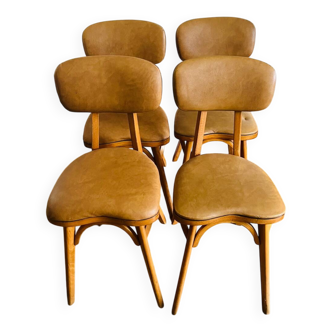 Suite de 4 chaises pieds compas
