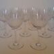 9 crystal water glasses from Baccarat Magenta Grain De Riz, height 15.5 cm.