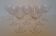 9 crystal water glasses from Baccarat Magenta Grain De Riz, height 15.5 cm.