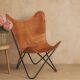 Handmade leather butterfly chair, modern lounge seating.