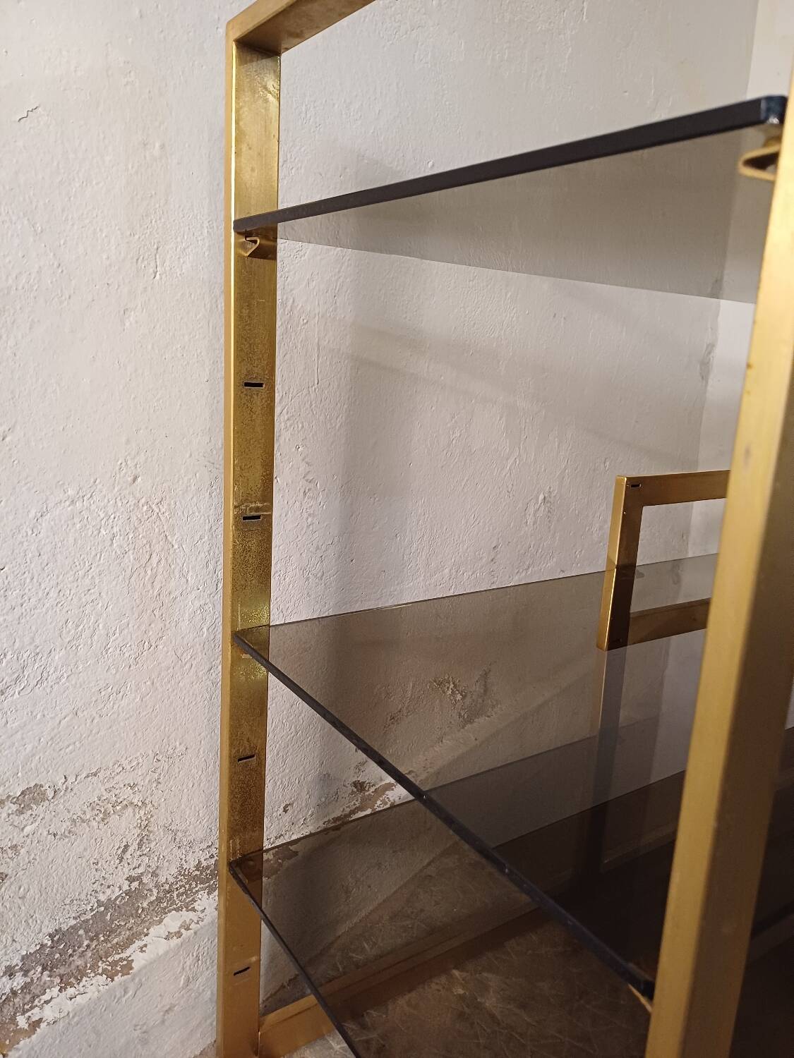 Brass shelf, smoked glass