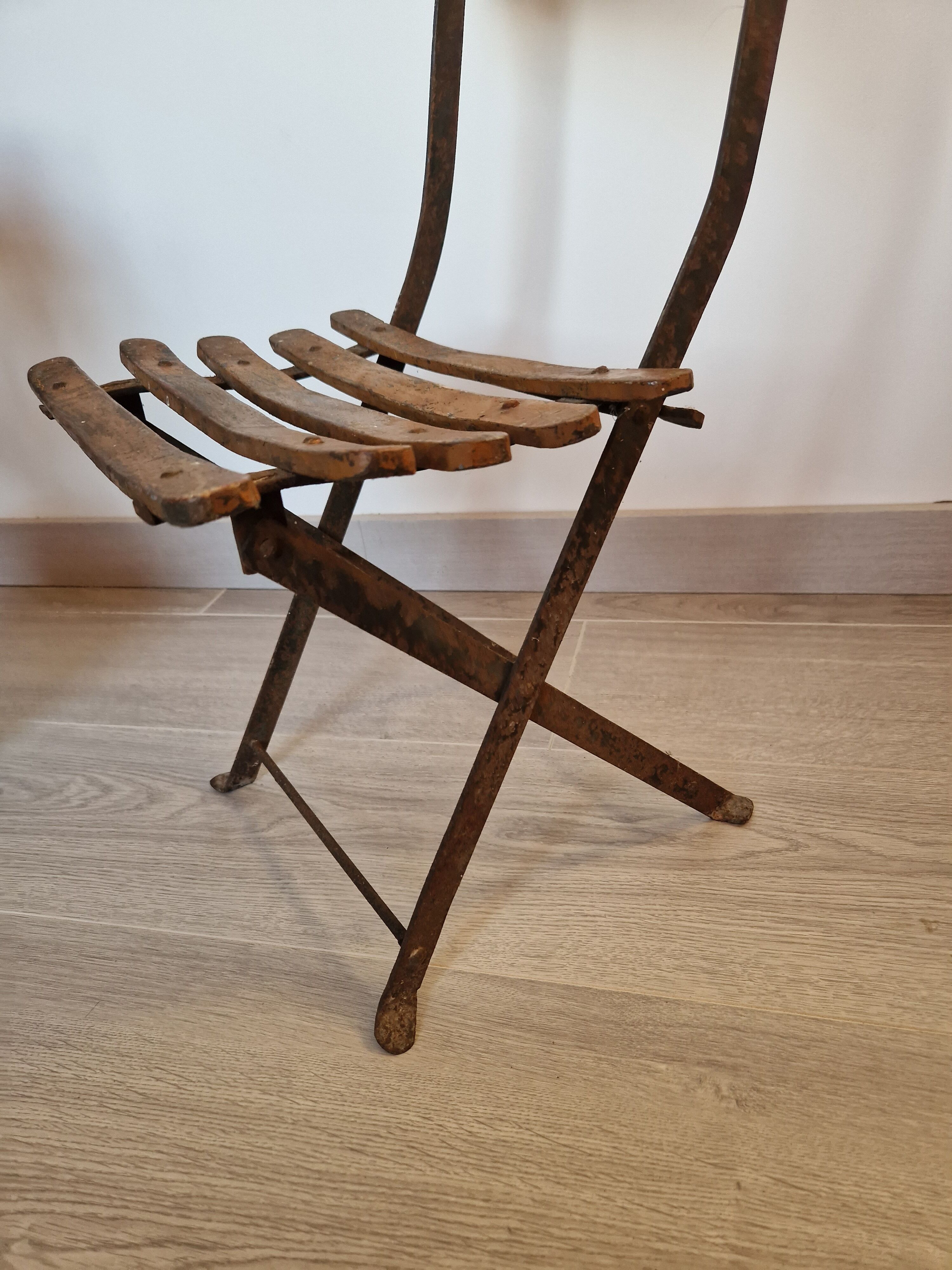 Old folding garden chair for children
