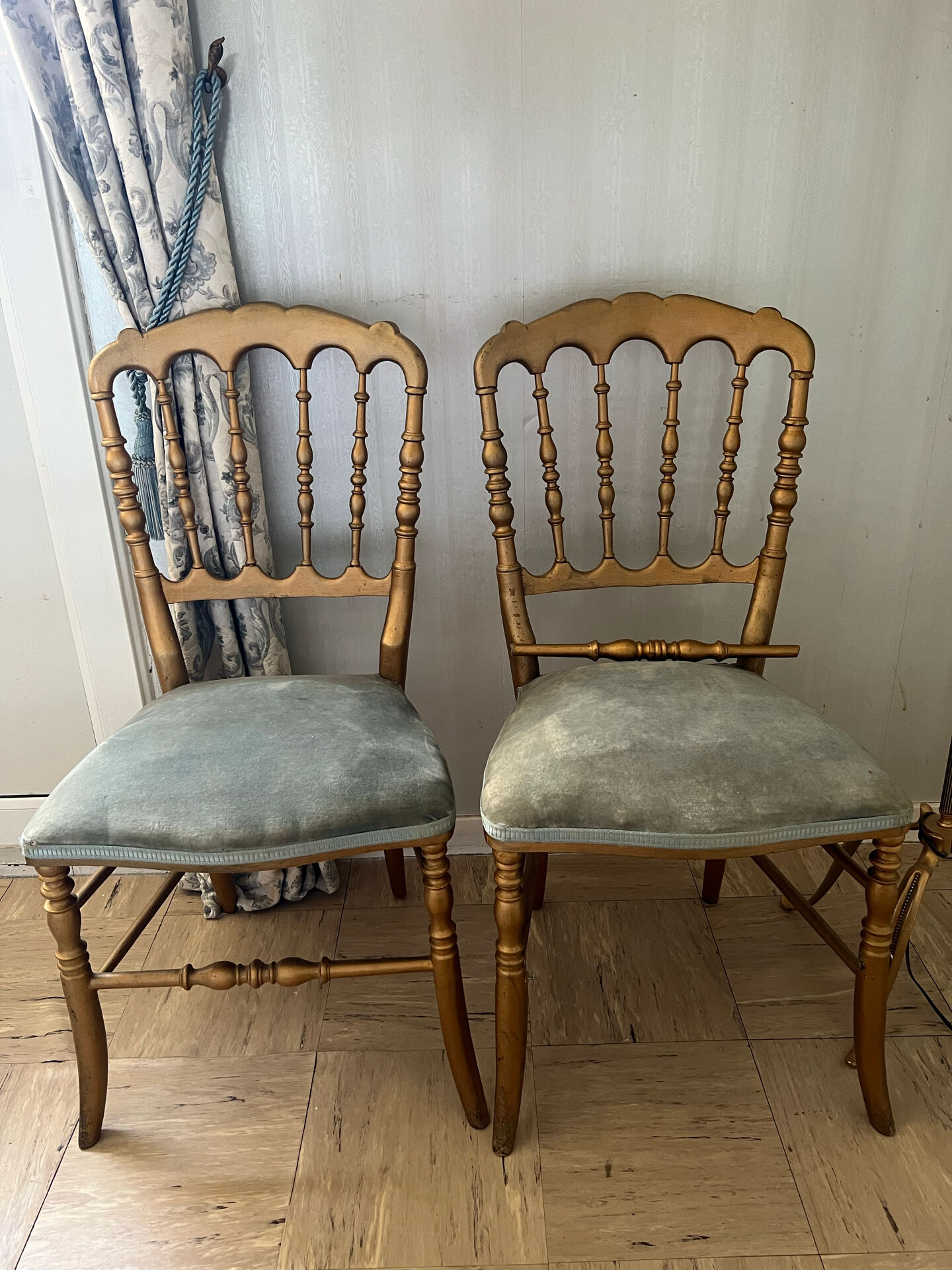 Pair of Napoleon III chairs in gilded wood with velvet upholstery.