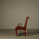 Pair of sculptural cognac leather armchairs, 1970s