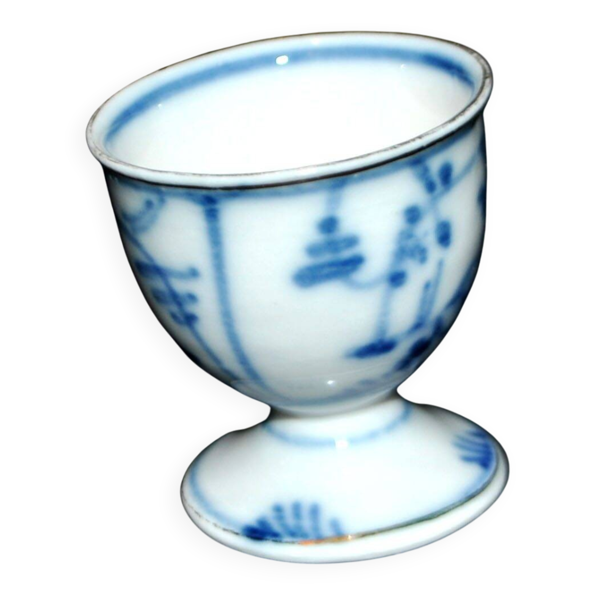 Antique porcelain diabolo egg cup with blue hand-painted onion decoration