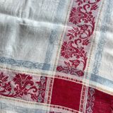 Old cotton tablecloth with flowers and fringes