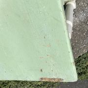 Rustic wooden dining table painted white and pale green, with a central drawer, 1950s.
