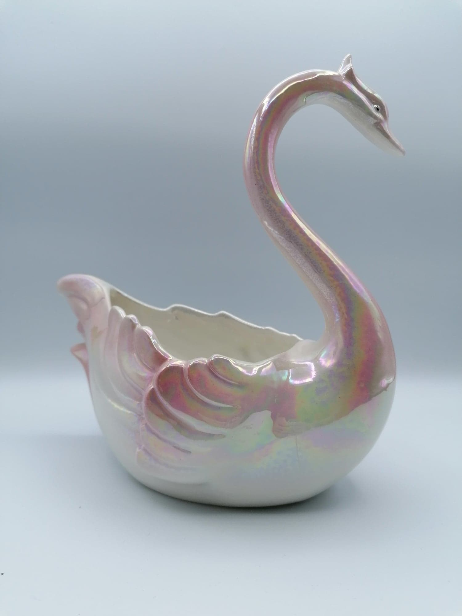 Porcelain swan pot cache