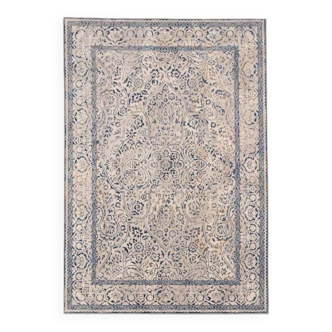 Blue, grey and beige oriental rug.