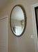 Miroir ancien ovale doré à décor floral – 105 × 70 cm  Élégant miroir