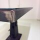 Industrial table with cast iron legs.