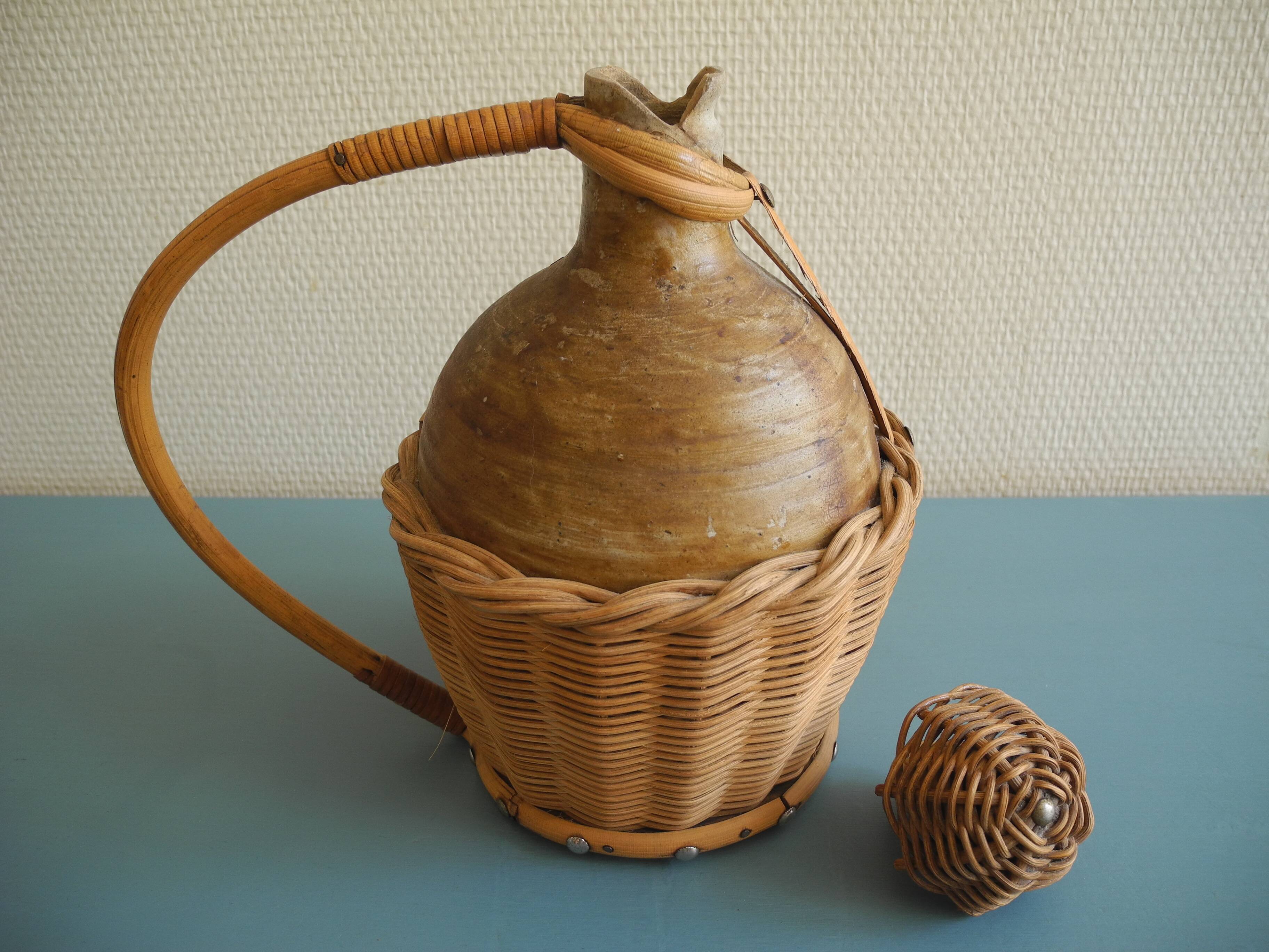 old stoneware bottle wicker vintage decoration stoneware bottle wicker