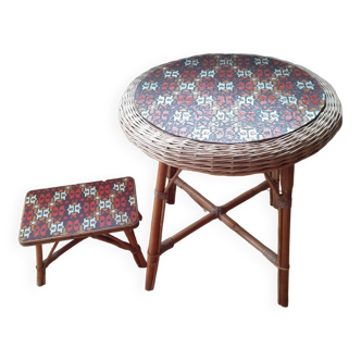 Rattan table and its small bench