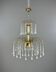 Golden brass chandelier with glass pendants, 20th century.