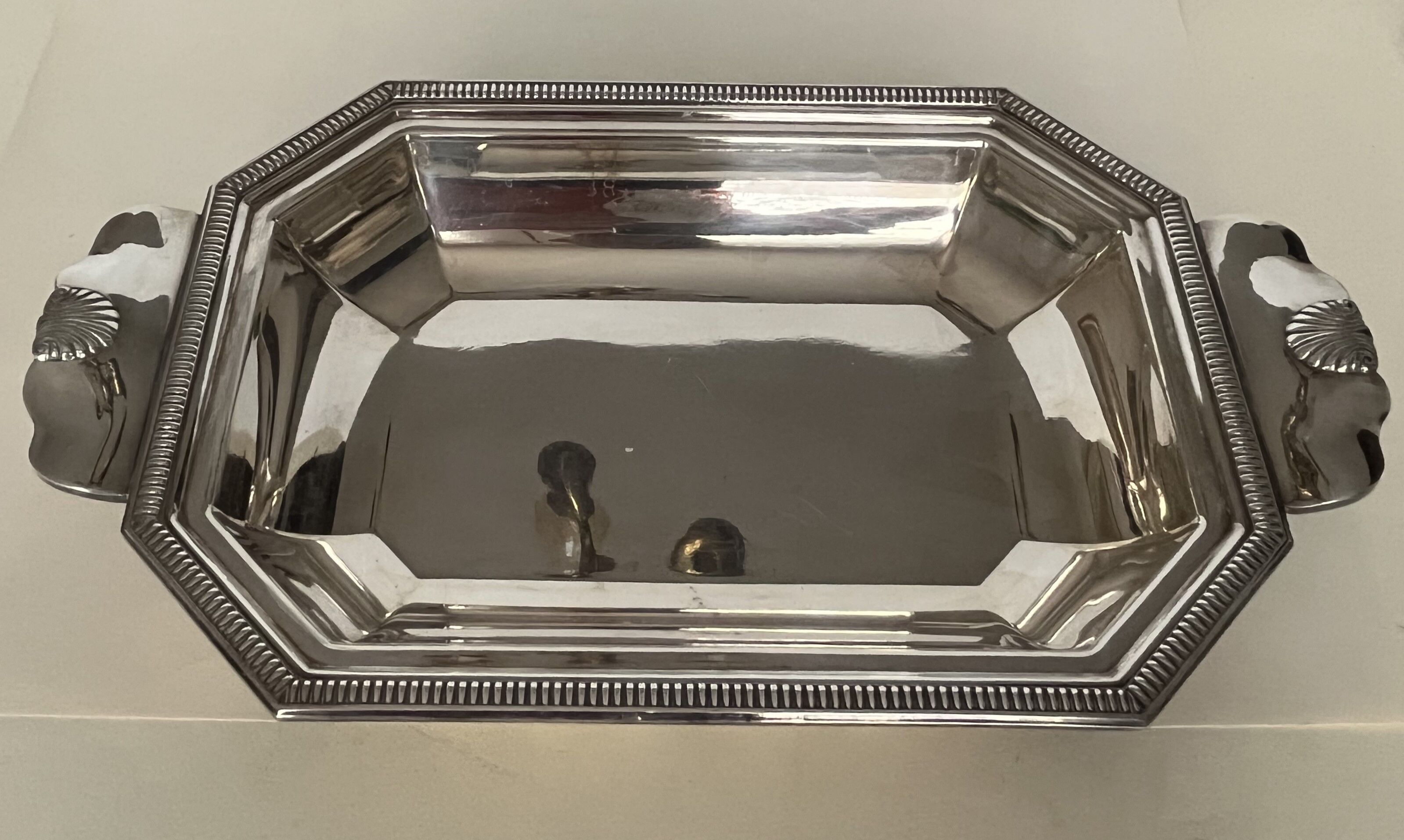 Dish in silver metal