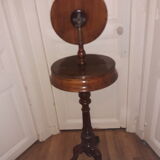 Barber on a mahogany stand