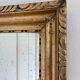 Antique French giltwood wall mirror in gold