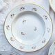 4 assiettes creuses l’amandinoise en porcelaine blanche dorées motif fleuris