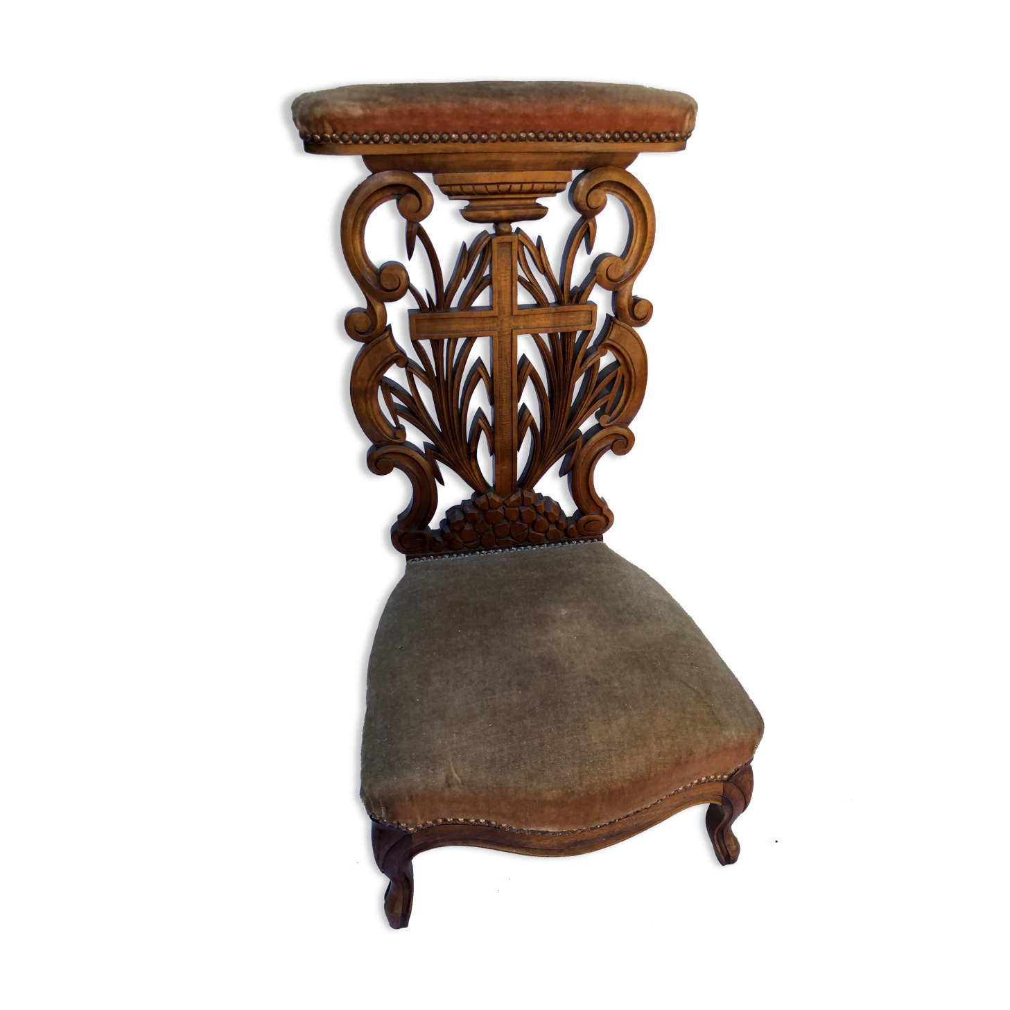 Low armchair in carved wood