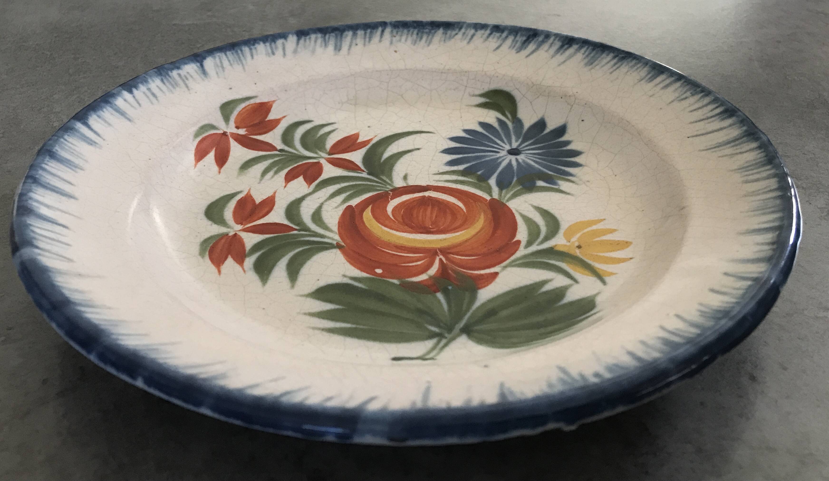 Old plate in auvillar earthenware, floral painting decoration, 19th century
