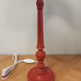 Red patinated wooden lamp