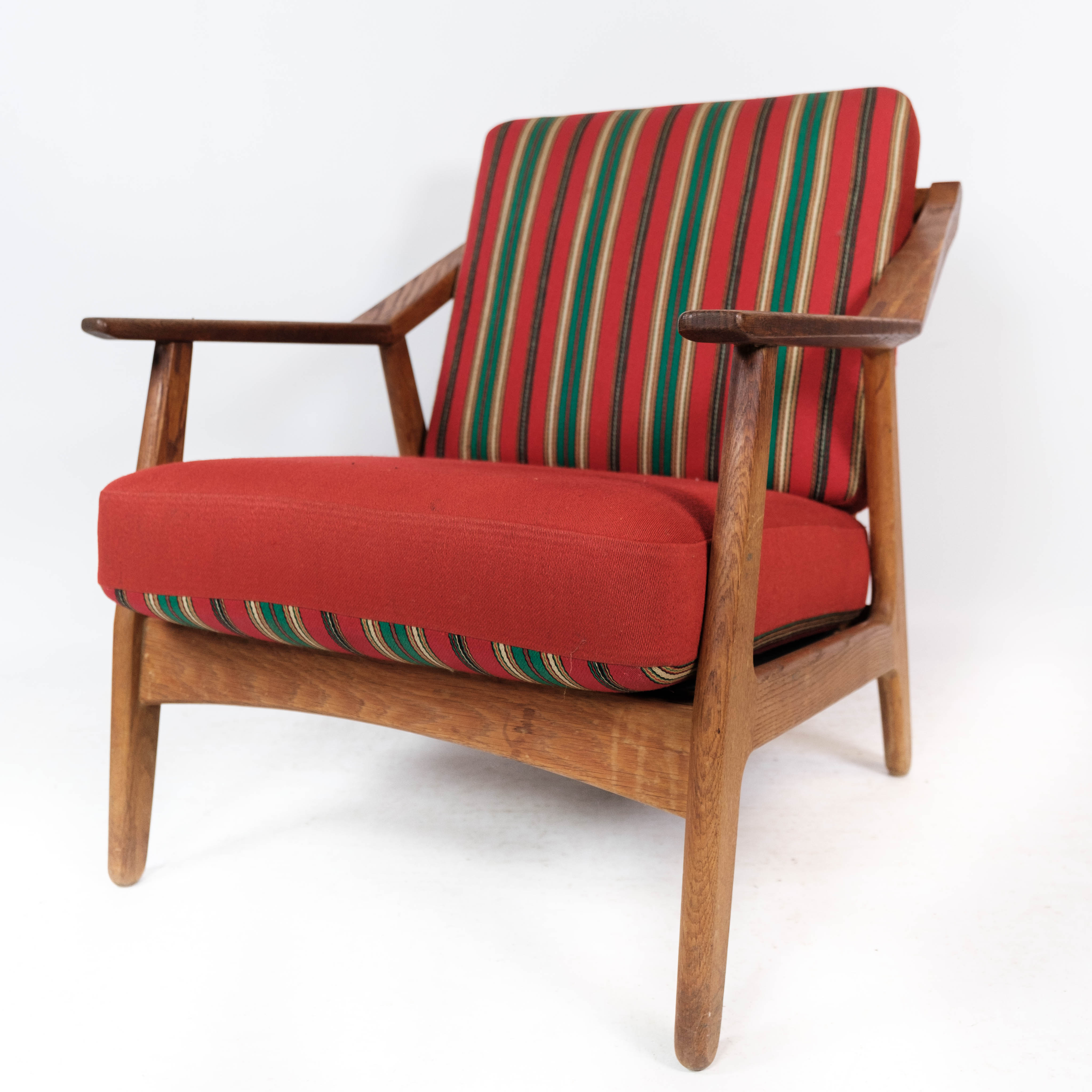 Armchair in oak and upholstered with red fabric, designed by H. Brockmann Pedersen, 1960s