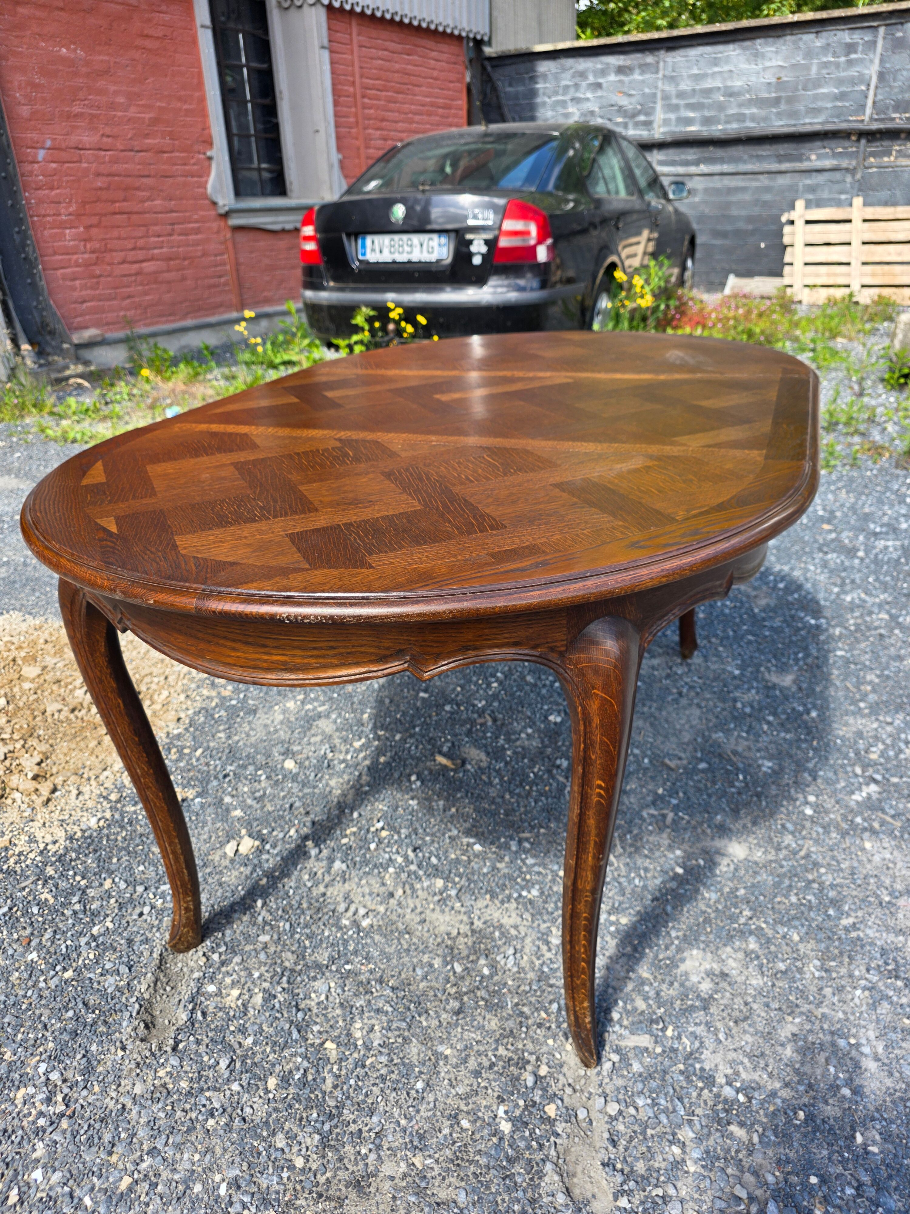 Extendable table in Louis XV style in oak (2 extensions)