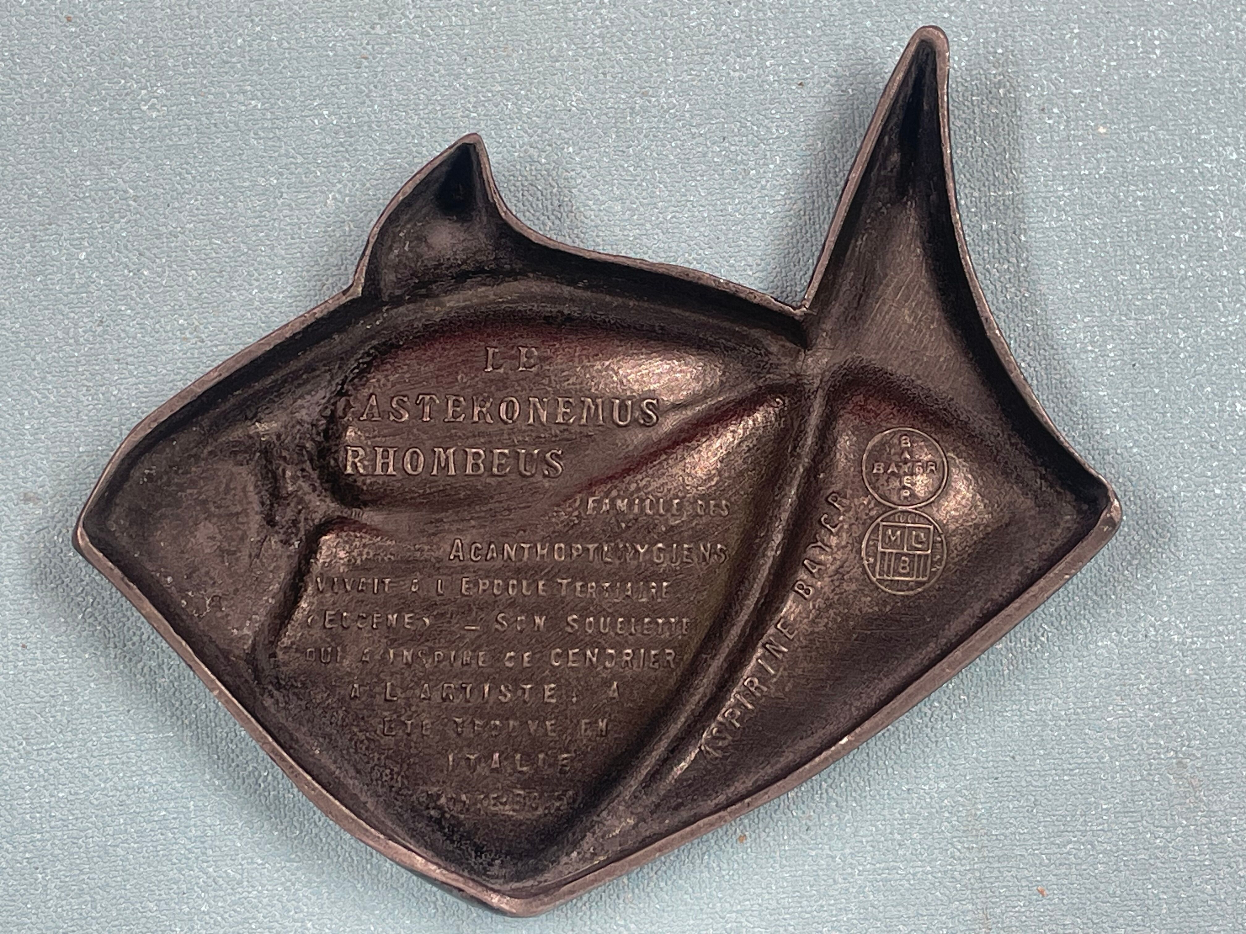 Empty pocket, art deco fish advertising ashtray signed J. André, regulates