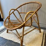 Rattan basket armchair with its cushion