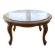 Classic round coffee table in wood with a marble top.