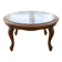 Classic round coffee table in wood with a marble top.