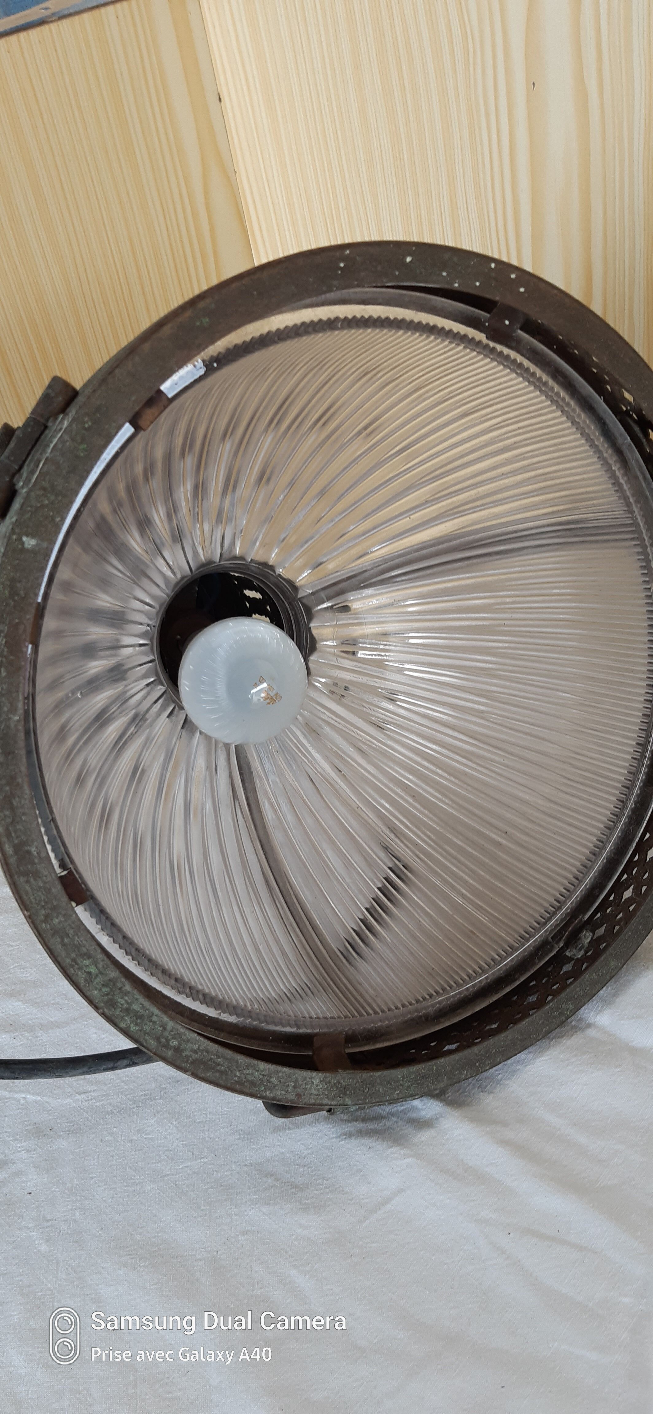 2 holophanous industrial lamps