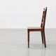 Art Deco oak side chair with carved rosette back and turned front legs, Bel