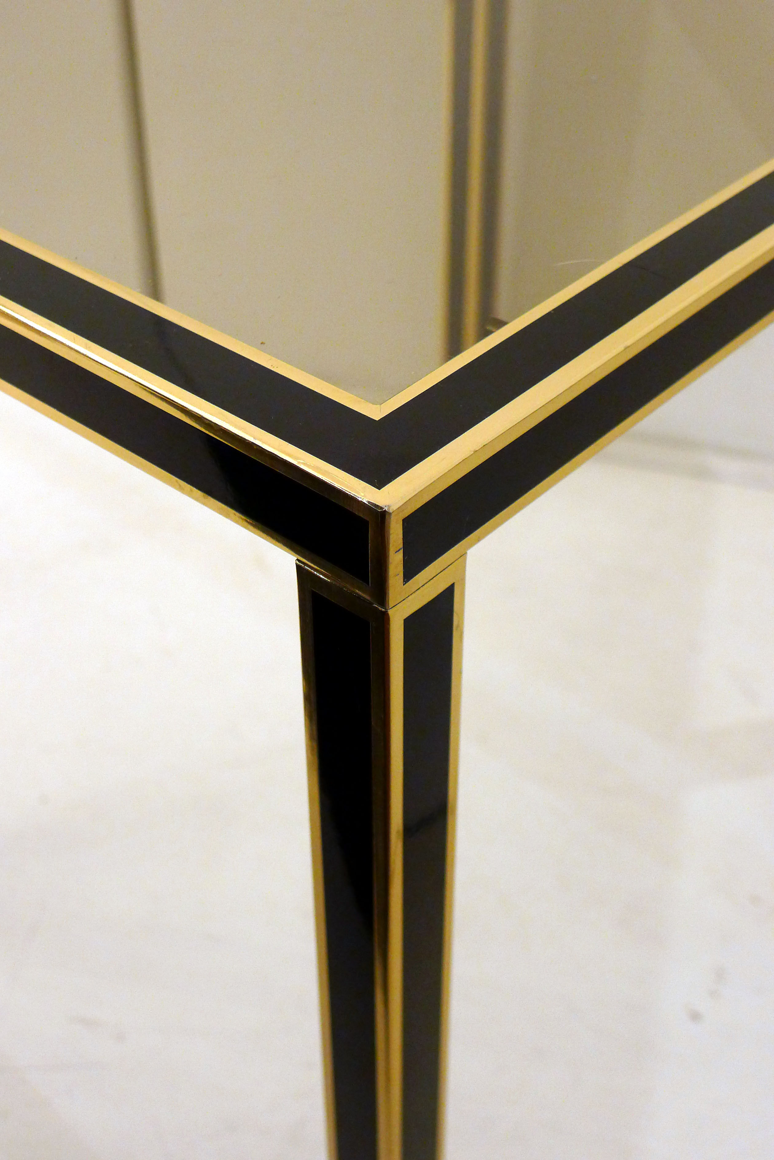 Pair of black & gold trundle tables 1970'