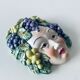 Ceramic wall face signed Il Falco