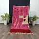 Handwoven Moroccan rug, natural wool, 250cm x 150cm, elegant decoration.