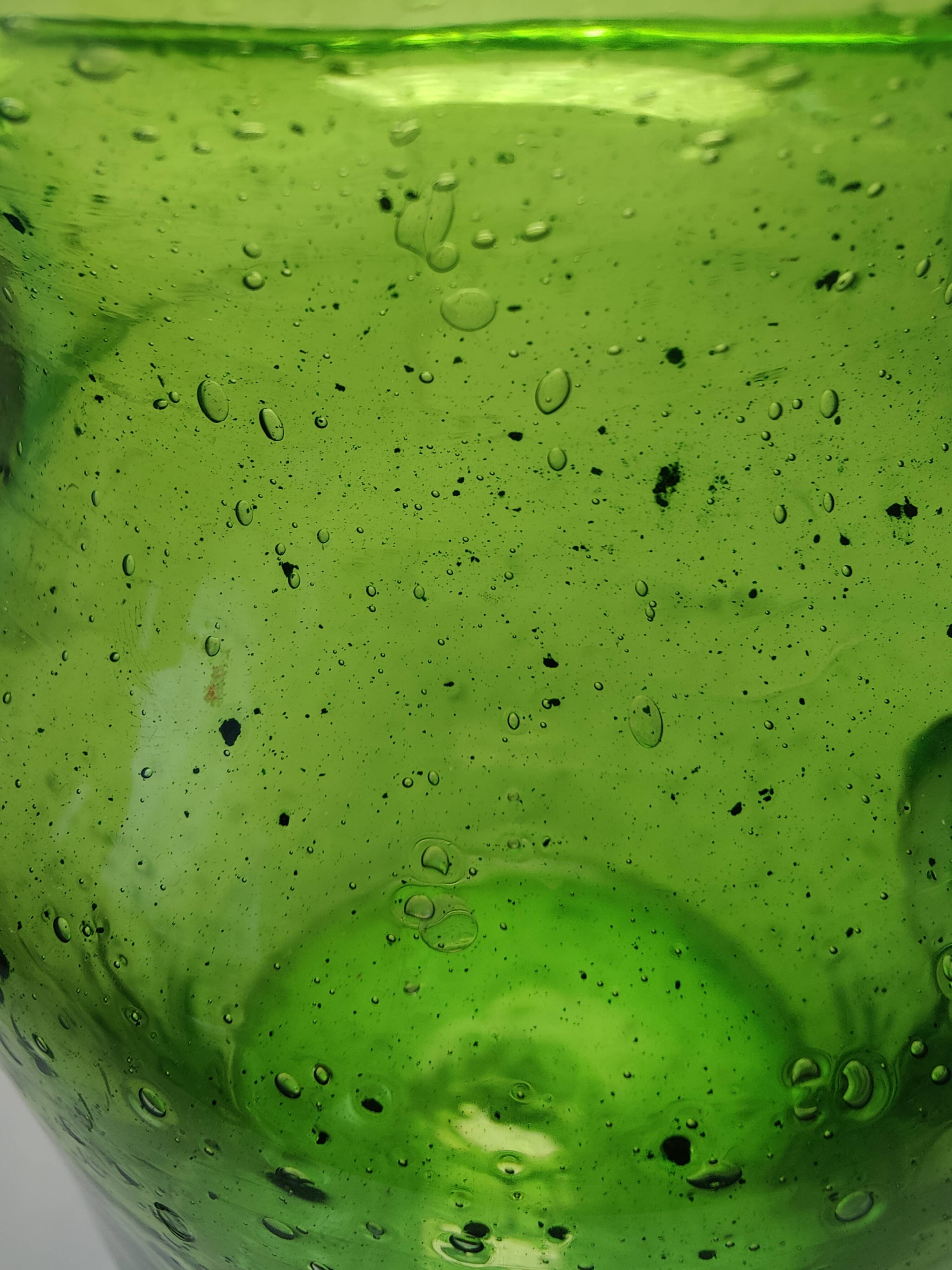 Bubble glass pitcher in the style of Biot or Empoli.