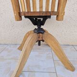 Swivel office chair in blond oak circa 1930