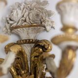 Pair of Louis XVI style wall lights in gilded and lacquered wood. Circa 1900.