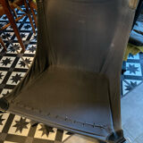 Leather Falcon armchair and footrest