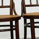 4 antique wooden and cane bistro chairs