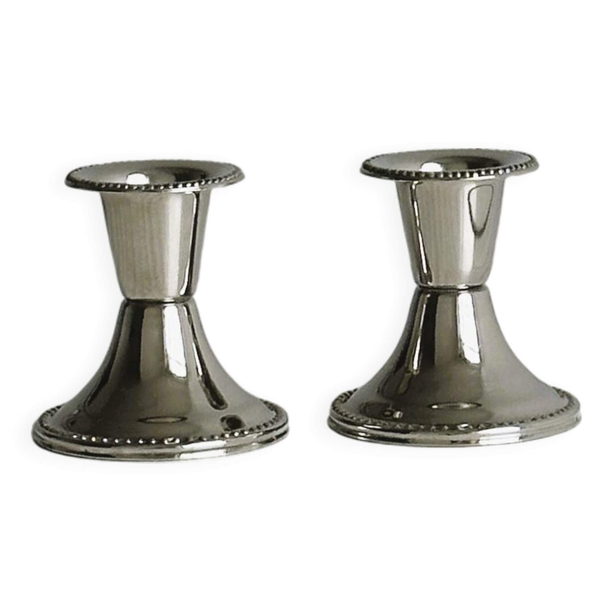 Pair of small light metal candlesticks