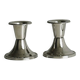 Pair of small light metal candlesticks