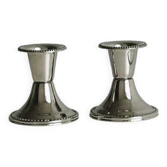 Paire de petits bougeoirs en métal léger