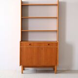 Vintage bookcase with storage compartment