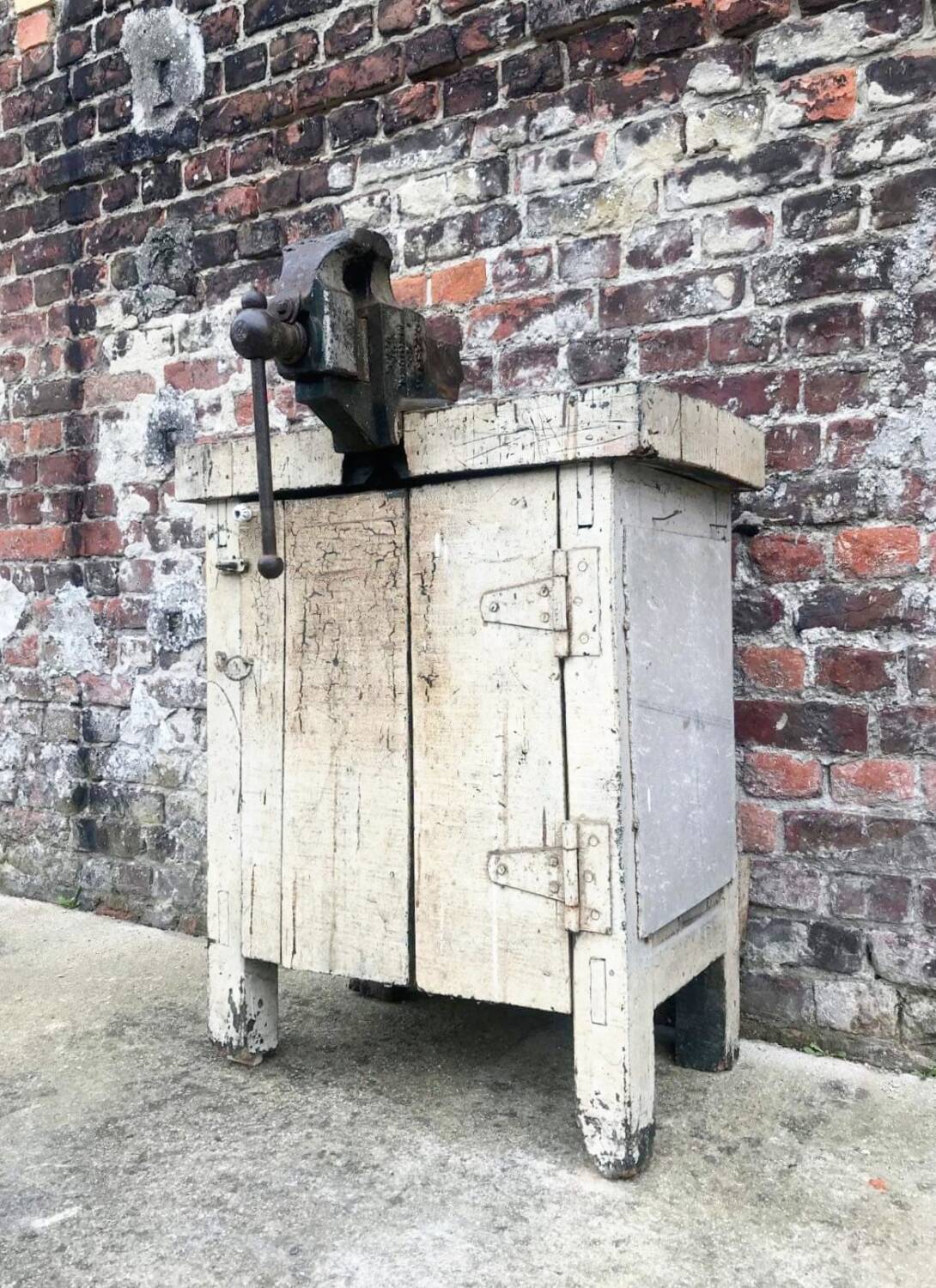 Vintage workbench with vice, old trade furniture